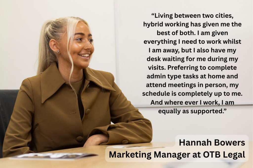 Girl smiling at desk describing Legal job vacancies UK