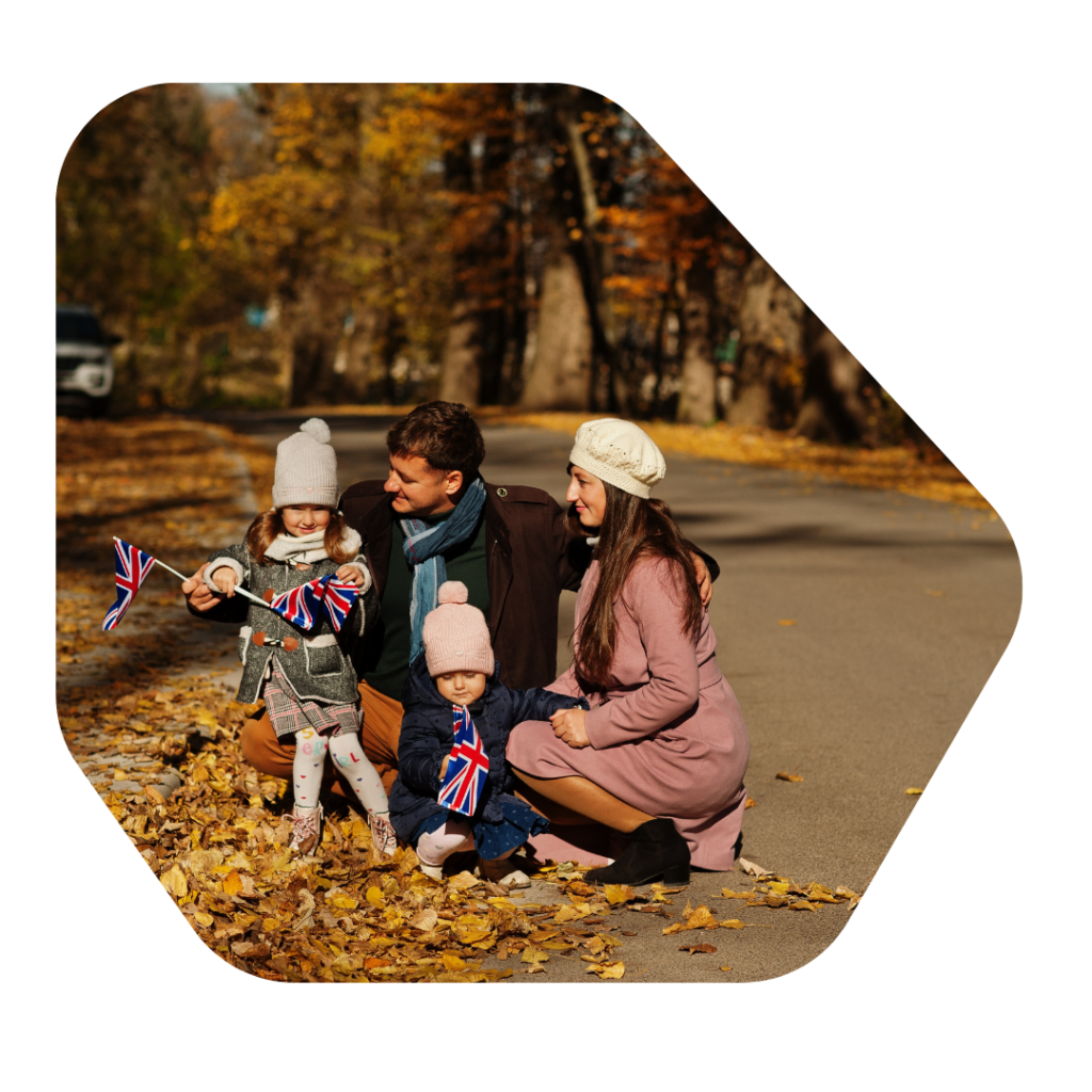 Family in autumn leaves celebrating getting a Child Dependant Visa Solicitors UK OTB Legal