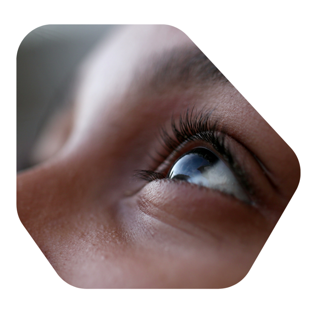 Childs eyes looking upwards. 