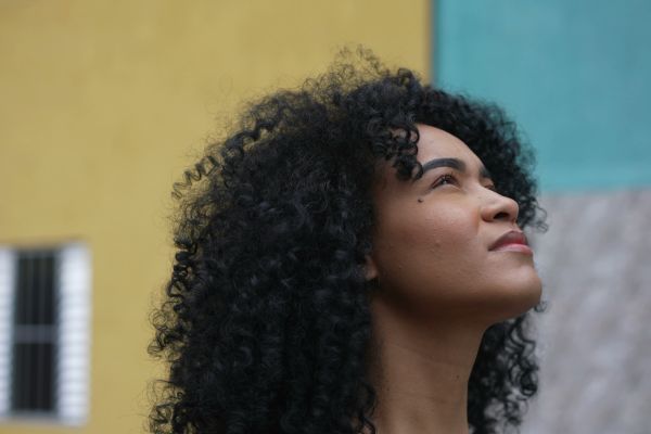 lady looking hopeful in securing a uk visit visa after refusal